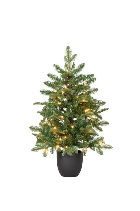 Julgran med belysning rusta